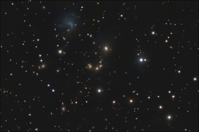 Galaxy cluster Abell 1111, with irregular galaxy ESO 347-8 at top